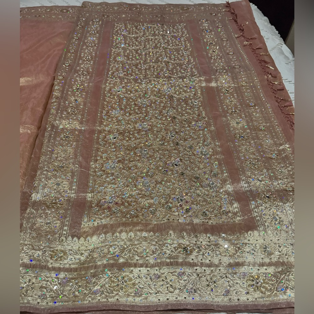 Elegant Pink and Gold Embroidered Saree